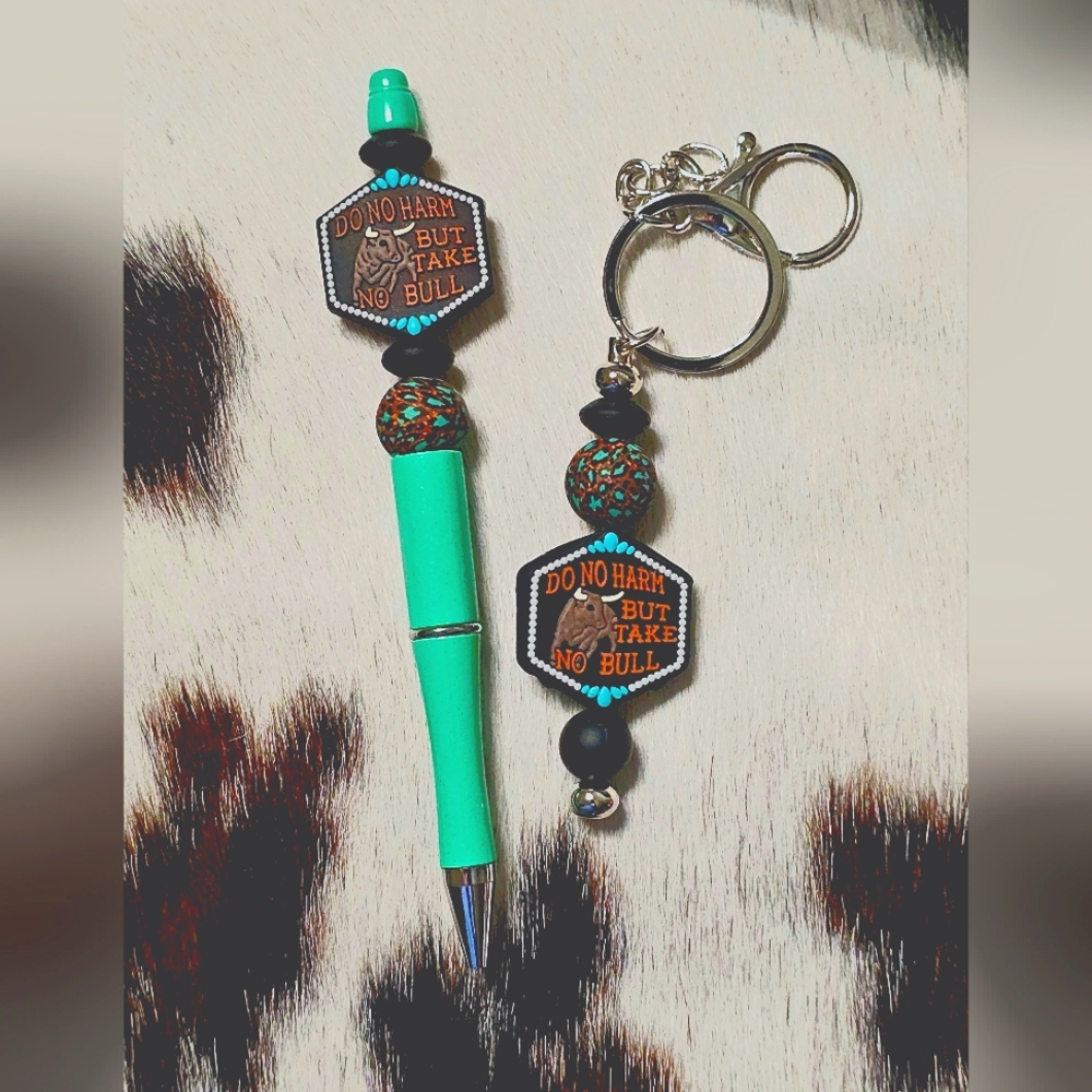 Western keychain and pen. Bull, rodeo